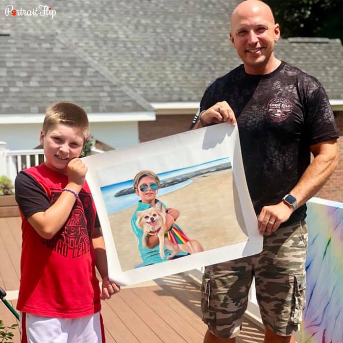 Picture of a bald man and a young boy holding child portraits which include a boy with a dog in his hand