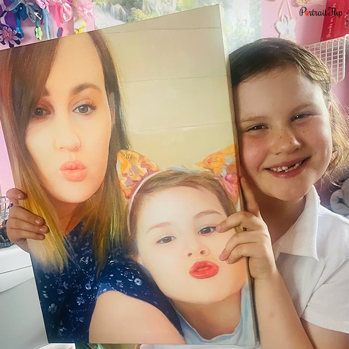 Picture of a young girl holding child portraits where she is seen with a lady pouting