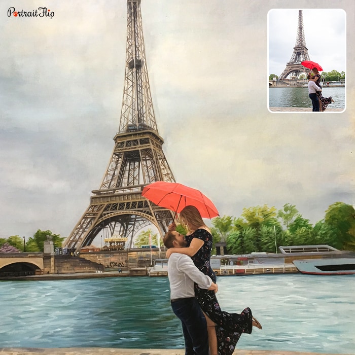 Engagement Paintings where a man is lifting a woman in his arms with a red umbrella in woman’s hand