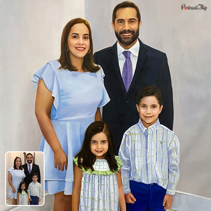 Picture of a man and a woman with a girl and a boy standing in front