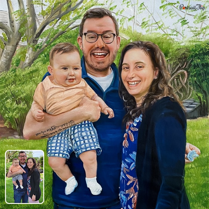 Family portraits of a man holding a baby with a woman beside him