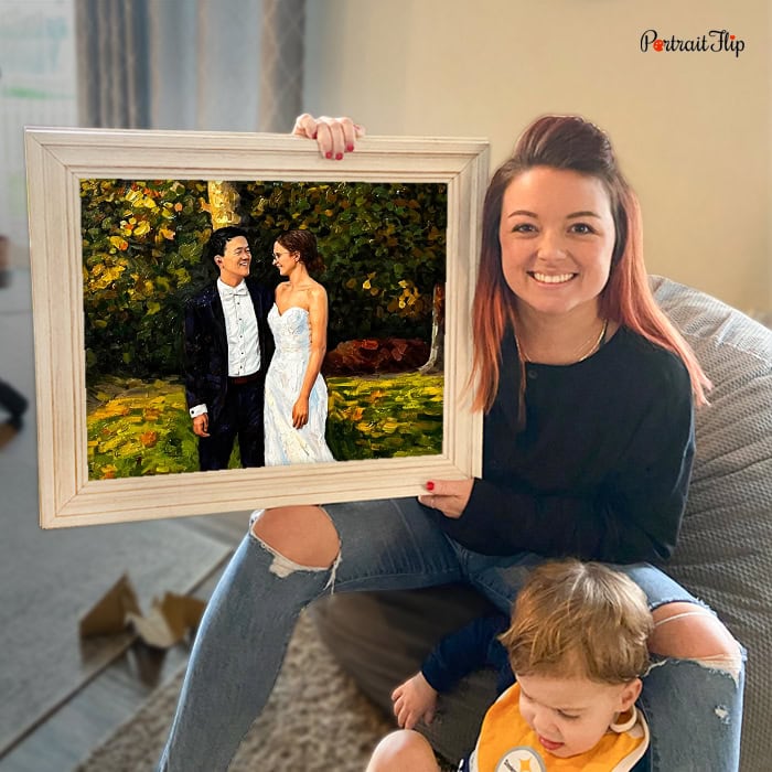 Woman holding a custom wedding portrait painting